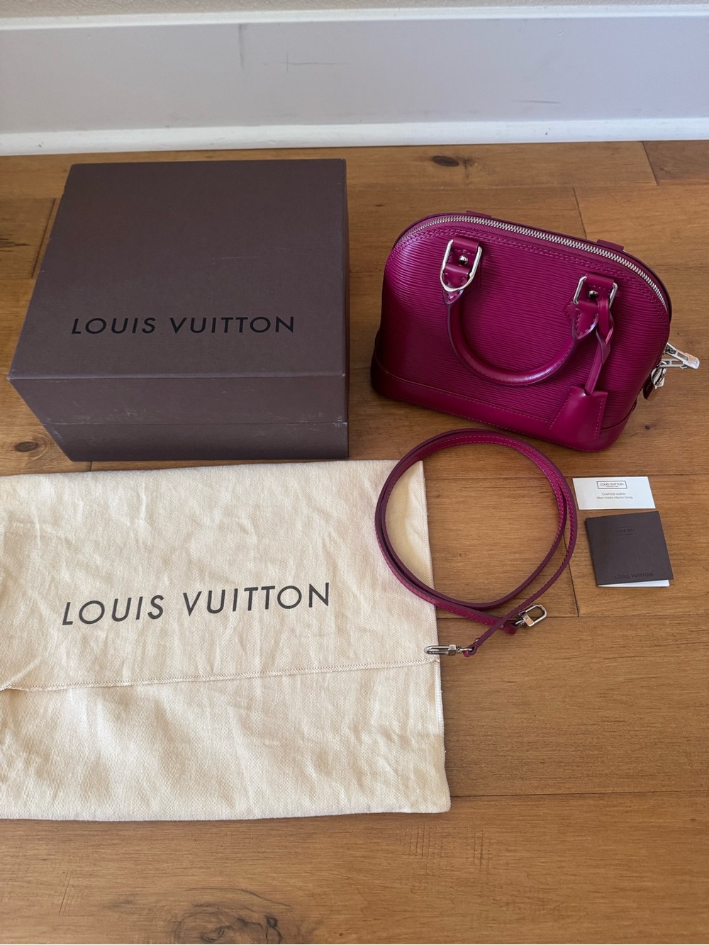 Louis Vuitton Alma BB Epi Leather Satchel in Fuchsia